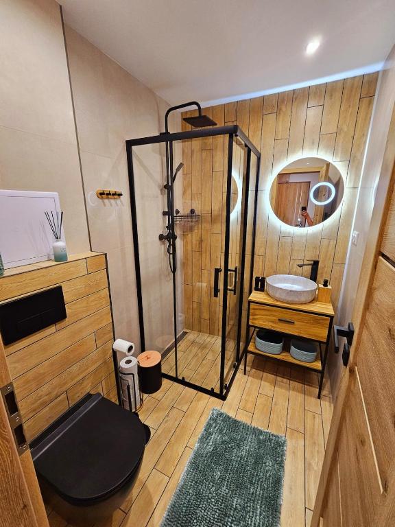 a bathroom with a shower and a sink at Modern apartment in the center of Martin in Martin