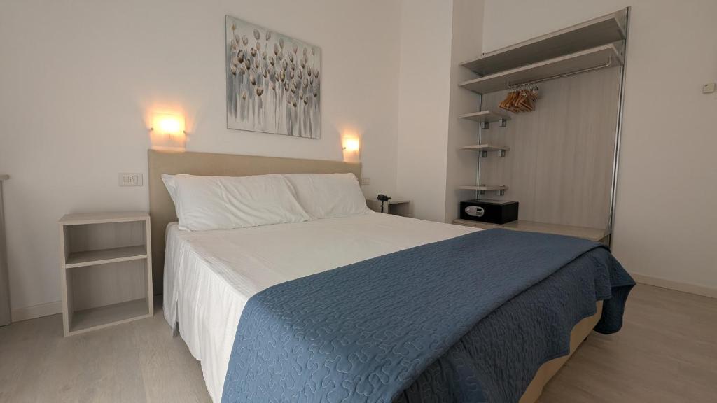 Postel nebo postele na pokoji v ubytování Hotel Villa Anthea