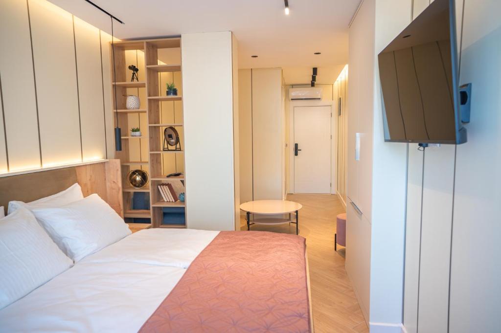 Postel nebo postele na pokoji v ubytování Guesthouse Sidro