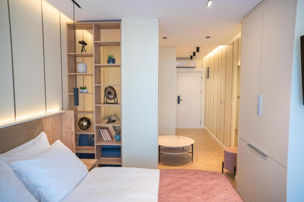 Postel nebo postele na pokoji v ubytování Guesthouse Sidro