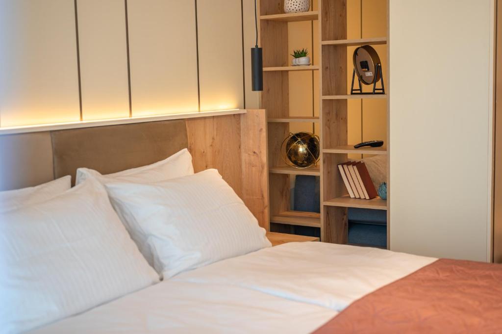 Postel nebo postele na pokoji v ubytování Guesthouse Sidro