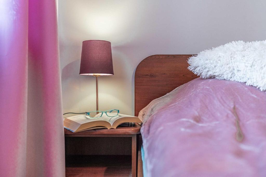 Posteľ alebo postele v izbe v ubytovaní Apartamenty Kluśka