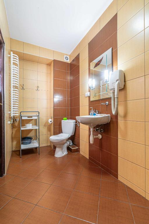 Kúpeľňa v ubytovaní Apartamenty Kluśka
