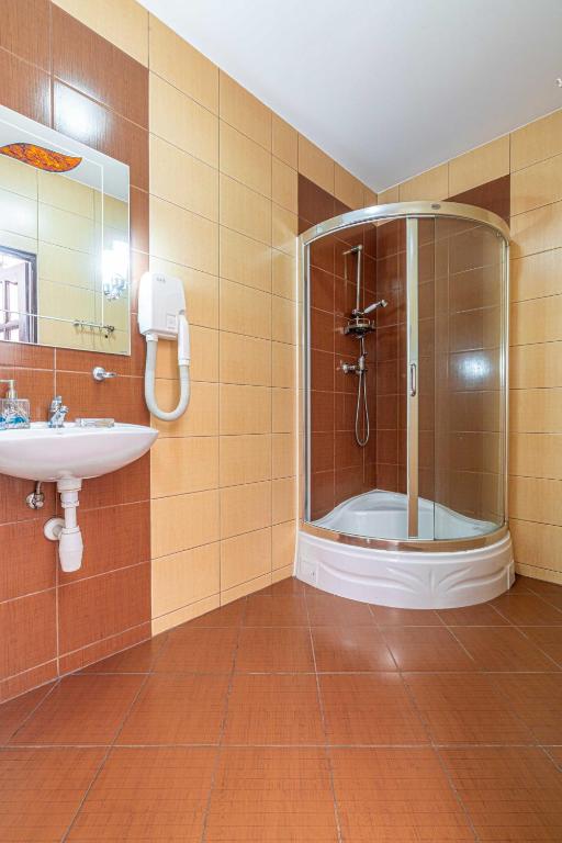 Kúpeľňa v ubytovaní Apartamenty Kluśka