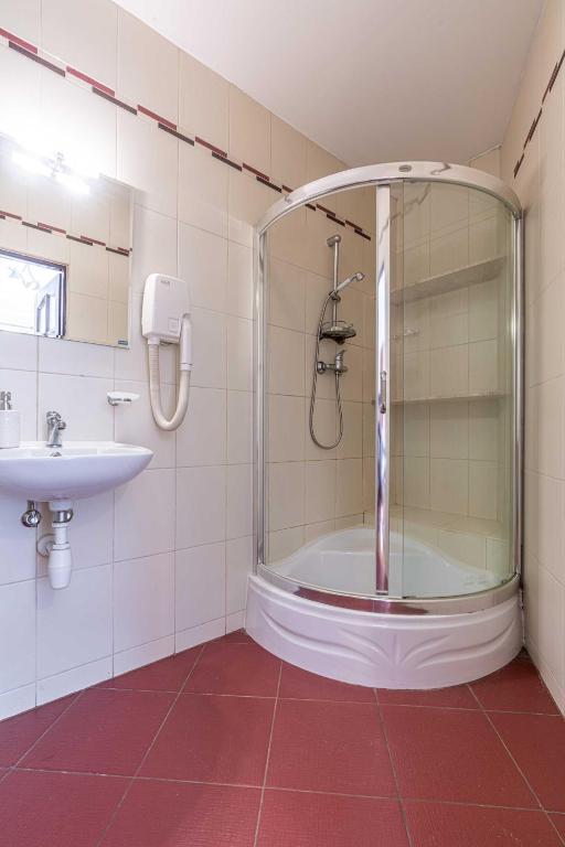 Kúpeľňa v ubytovaní Apartamenty Kluśka