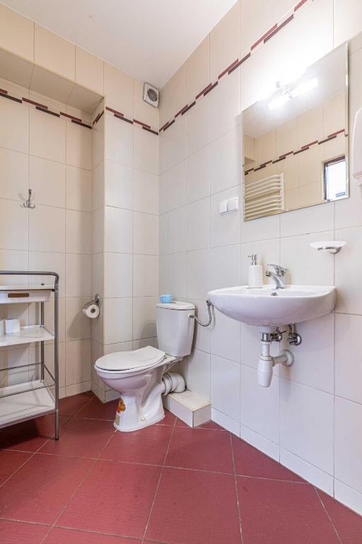 Kúpeľňa v ubytovaní Apartamenty Kluśka