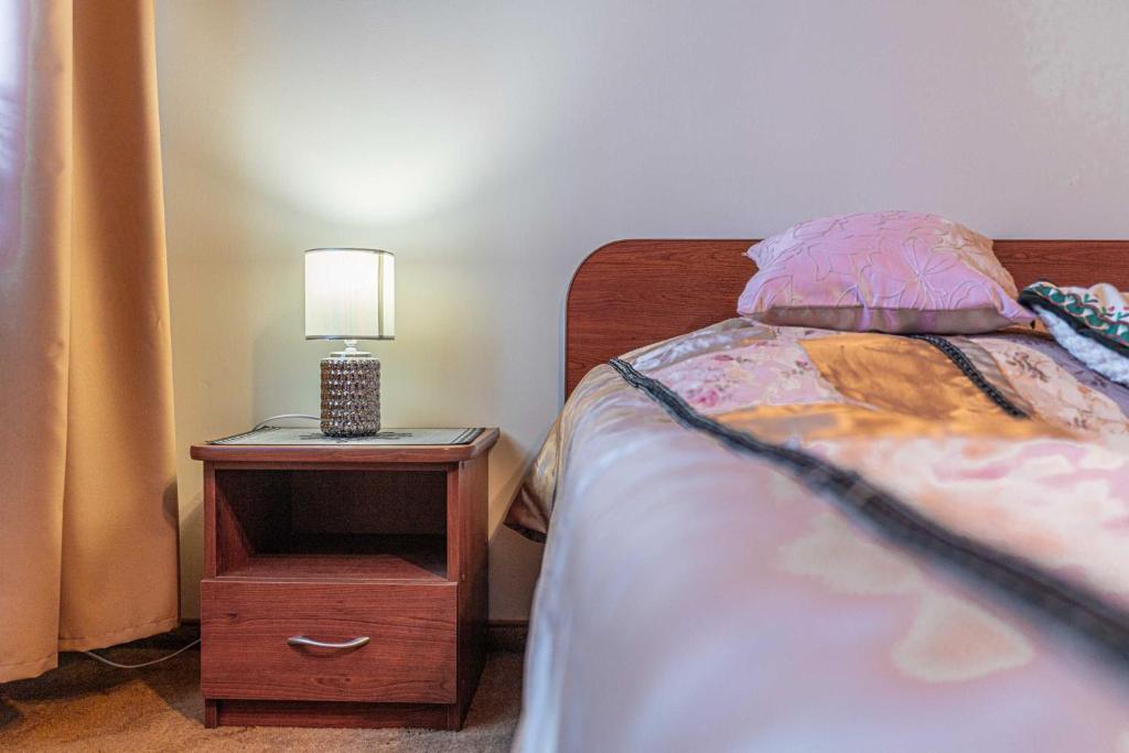 Posteľ alebo postele v izbe v ubytovaní Apartamenty Kluśka