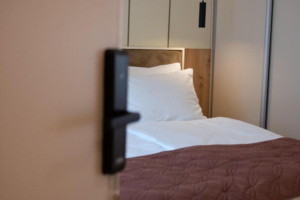 Postel nebo postele na pokoji v ubytování Guesthouse Sidro