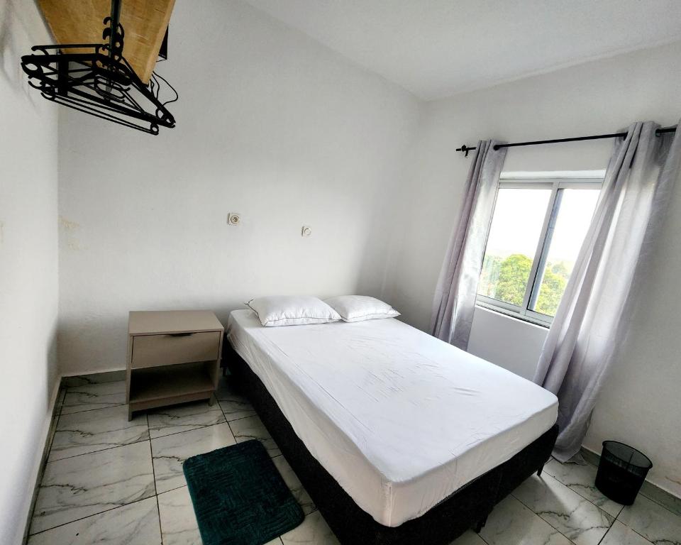 Postel nebo postele na pokoji v ubytování Apartment with panoramic view