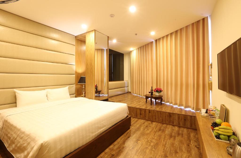 Postel nebo postele na pokoji v ubytování Au Viet Hotel