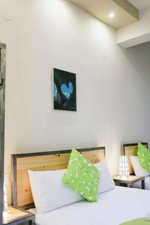 Postel nebo postele na pokoji v ubytování Zonita Guest House