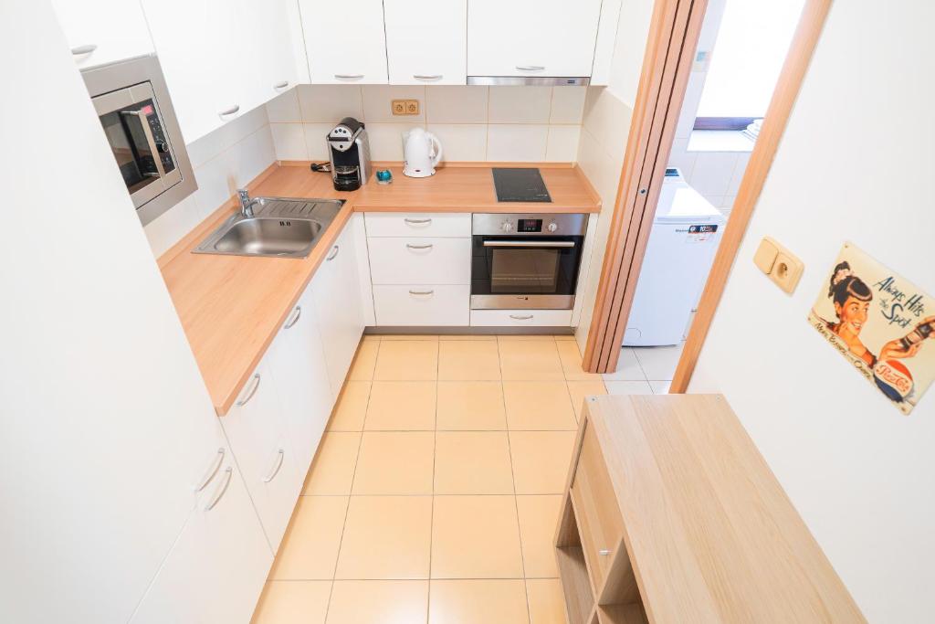 Kuchnia lub aneks kuchenny w obiekcie Apartmán Hotel Vomočil Bystré