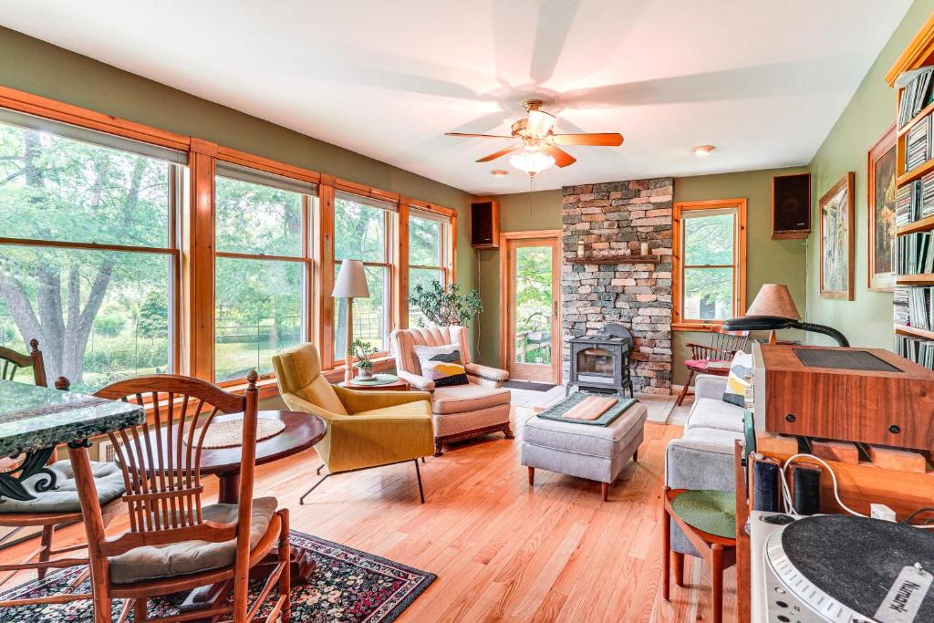 a living room filled with furniture and a fireplace at Peaceful Countryside Retreat with Yard in Frenchtown in Frenchtown