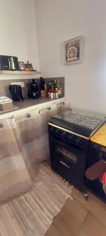 Kuchyň nebo kuchyňský kout v ubytování Petite Maison Premium vue mer