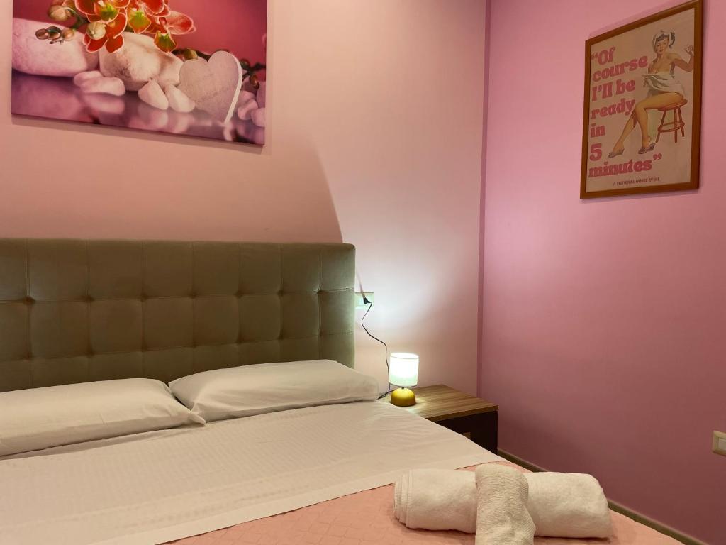 Ένα ή περισσότερα κρεβάτια σε δωμάτιο στο Giulieda in Magicland