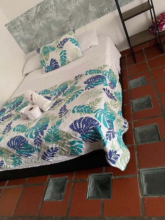 Rúm í herbergi á Hotel Santa Fe del Parque