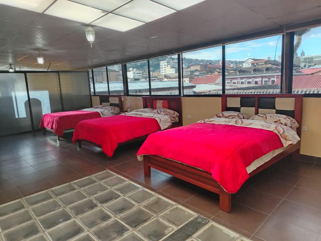 Postel nebo postele na pokoji v ubytování Hostal Mediodía MATRIZ