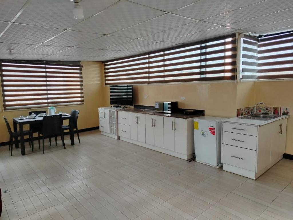 Kuchyň nebo kuchyňský kout v ubytování Hostal Mediodía MATRIZ