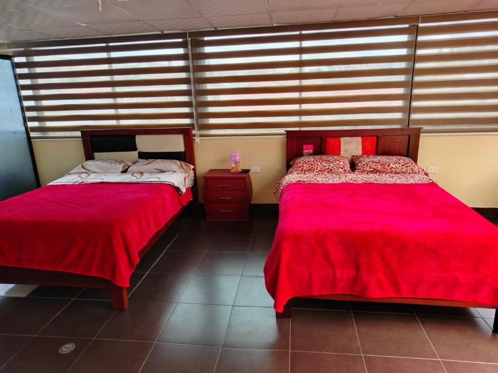 Postel nebo postele na pokoji v ubytování Hostal Mediodía MATRIZ