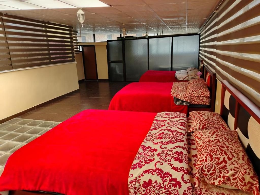 Postel nebo postele na pokoji v ubytování Hostal Mediodía MATRIZ