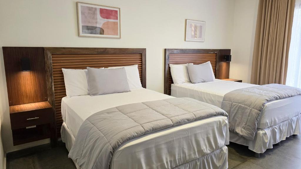 Ліжко або ліжка в номері Hotel Soliman