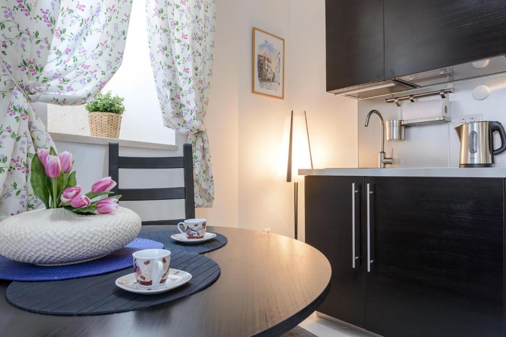 Kuchyňa alebo kuchynka v ubytovaní Apartment MiNo