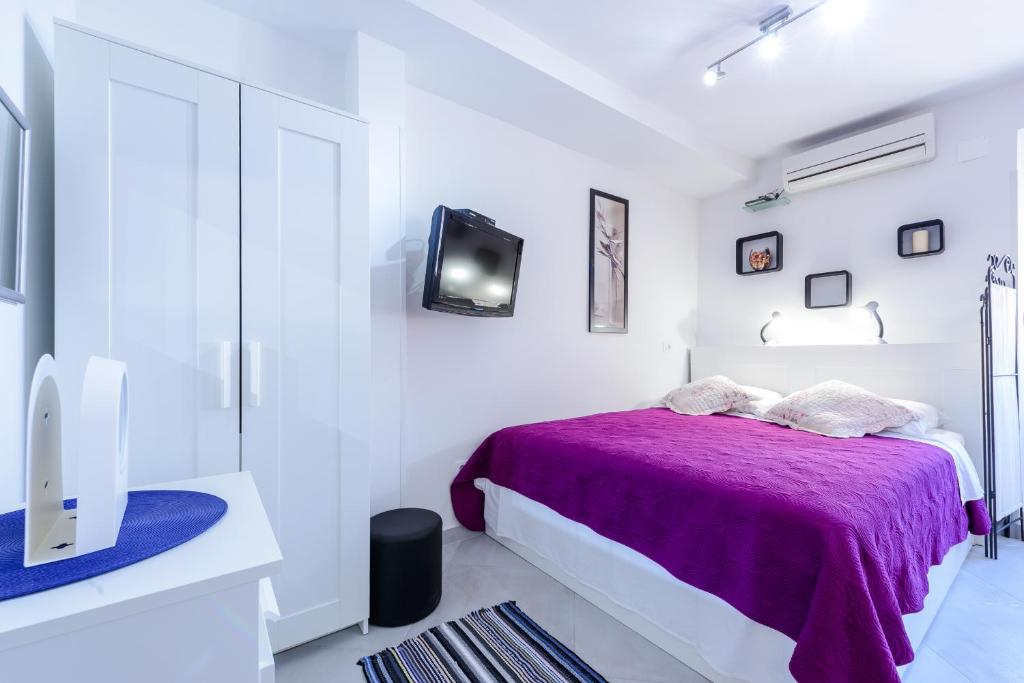 Posteľ alebo postele v izbe v ubytovaní Apartment MiNo