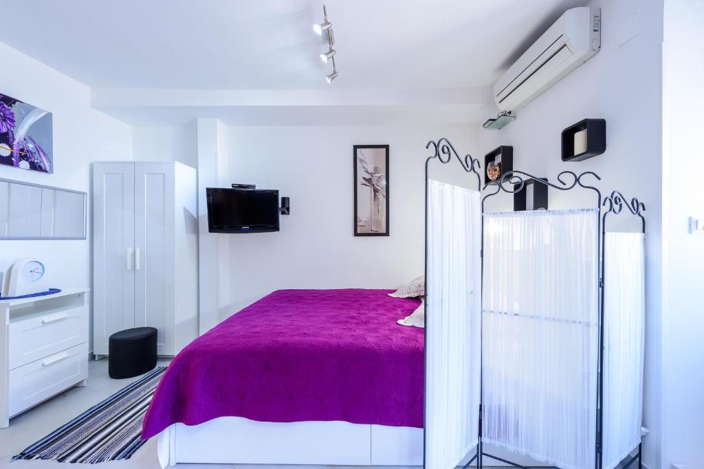 Posteľ alebo postele v izbe v ubytovaní Apartment MiNo