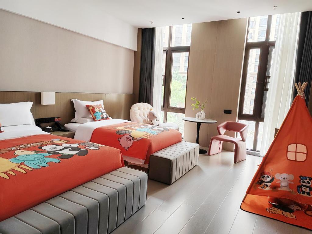 Postel nebo postele na pokoji v ubytování Beijing Suiyu Hotel