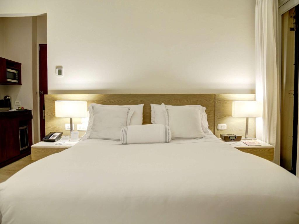 Postel nebo postele na pokoji v ubytování Hotel Boutique Bovedas de Santa Clara By Accor