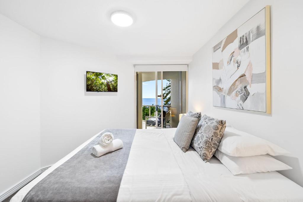 Postel nebo postele na pokoji v ubytování Zanzibar 404, Sensational 2 Bedroom Oceanview Apartment