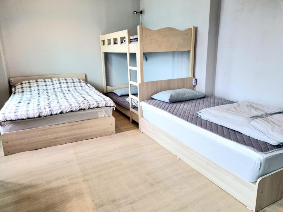 Postel nebo postele na pokoji v ubytování Wandonesia
