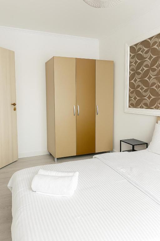 Postel nebo postele na pokoji v ubytování DD Apartments - Iuliu Moldovan