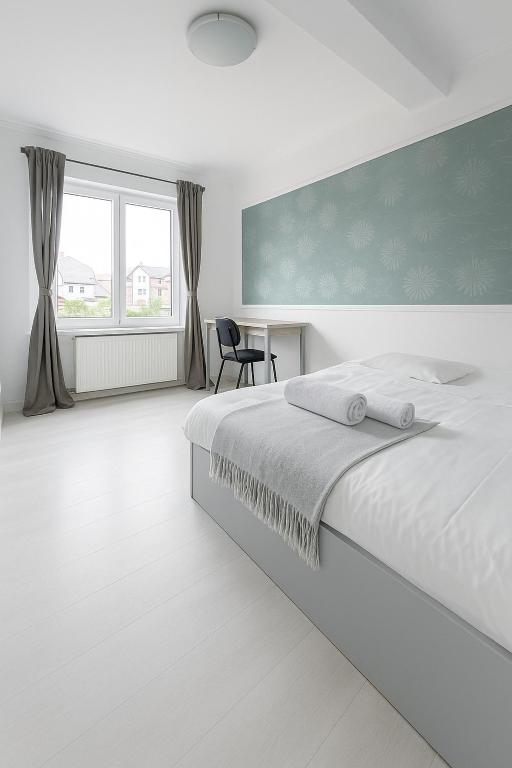Postel nebo postele na pokoji v ubytování DD Apartments - Iuliu Moldovan