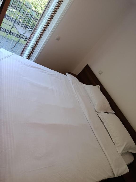 Postel nebo postele na pokoji v ubytování Complex Adela Transfăgărășan