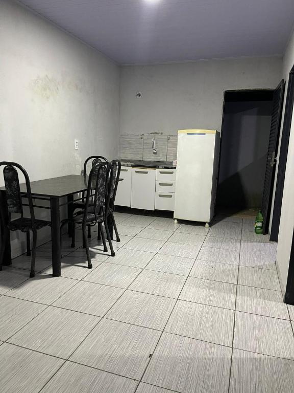 Η κουζίνα ή μικρή κουζίνα στο Casa no buritis