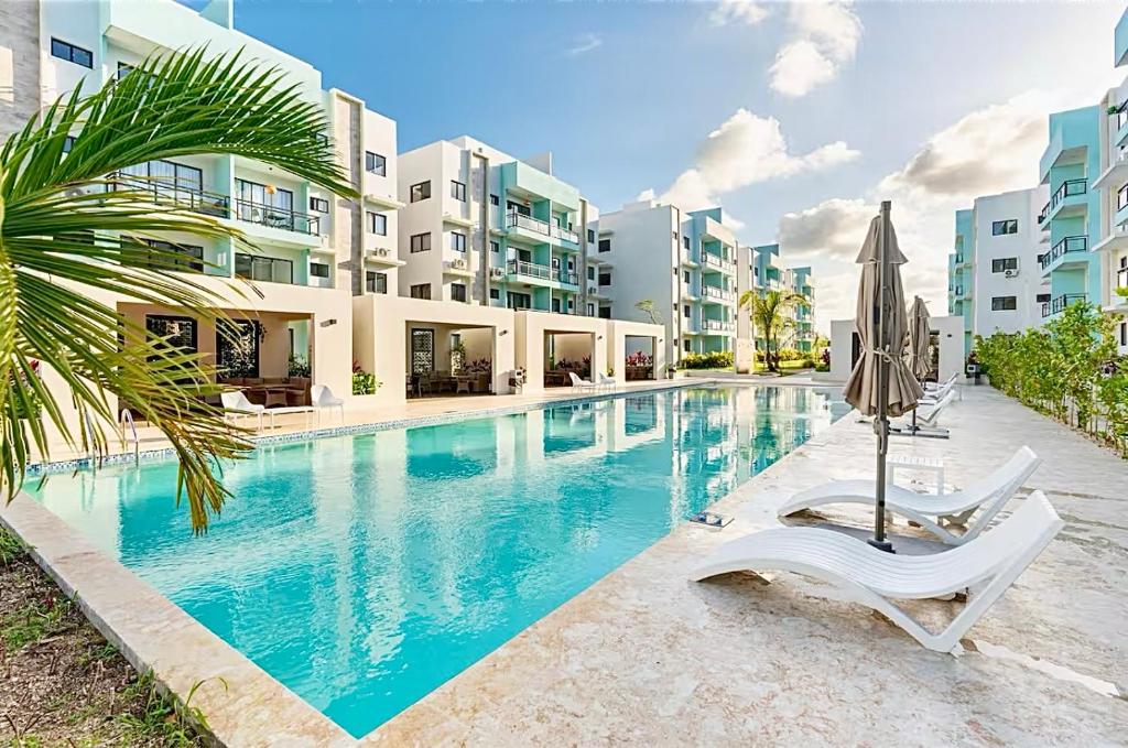 La alberca dentro o cerca de Palm Vibe Condo - Downtown Punta Cana
