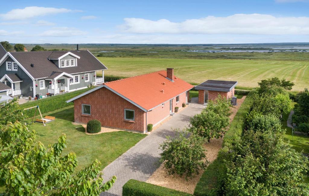 an aerial view of a home with an orange roof at 3 Bedroom Cozy Home In Tarm in Tarm