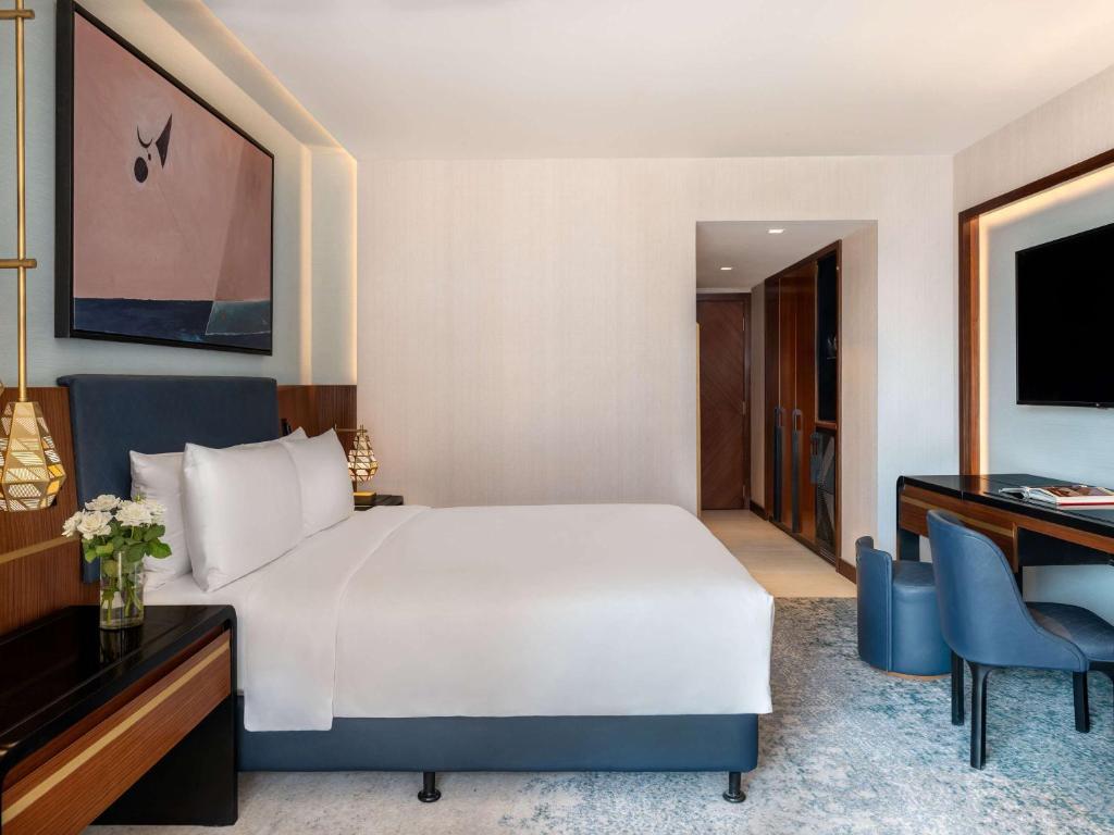 TV a/nebo společenská místnost v ubytování Sofitel Cairo Downtown Nile