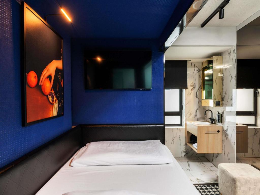 Postel nebo postele na pokoji v ubytování ibis Styles Hasselt City Centre