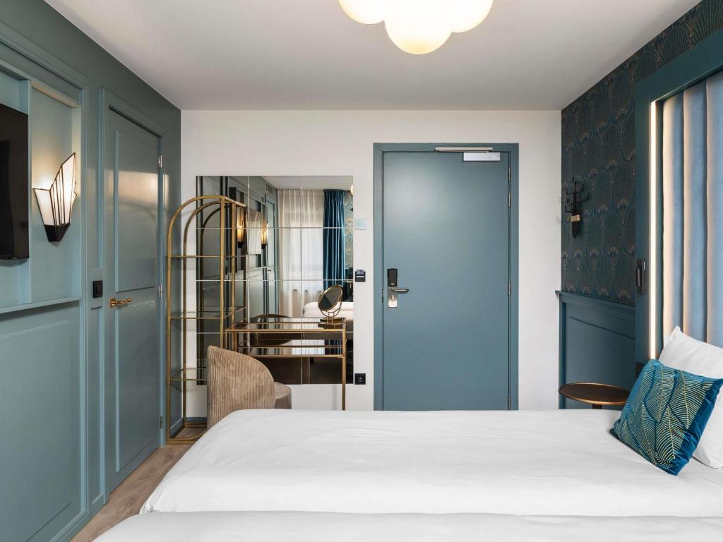 Postel nebo postele na pokoji v ubytování ibis Styles Hasselt City Centre