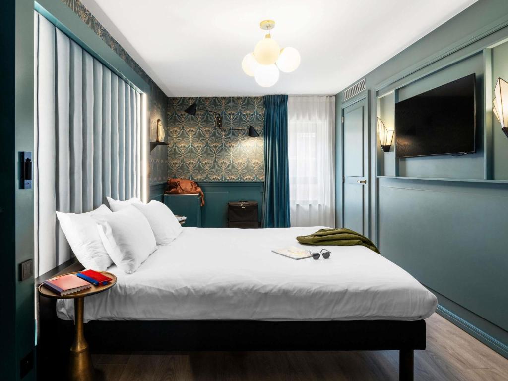 Postel nebo postele na pokoji v ubytování ibis Styles Hasselt City Centre