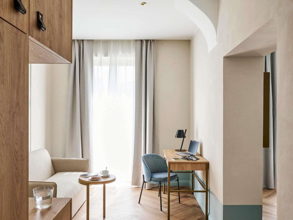 Posezení v ubytování Hotel Giacomo Morra Alba - Handwritten Collection