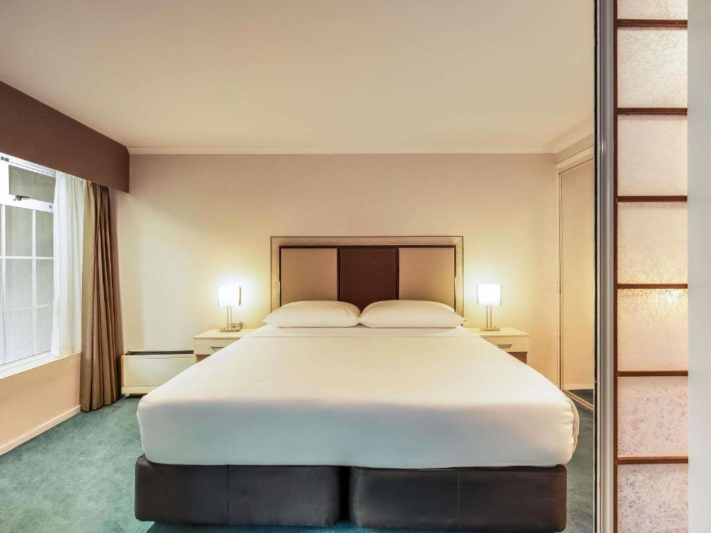 Postel nebo postele na pokoji v ubytování Wairakei Resort Taupo