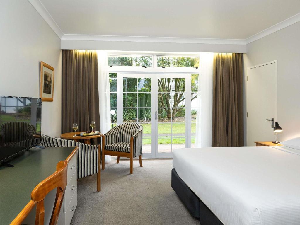 Postel nebo postele na pokoji v ubytování Wairakei Resort Taupo
