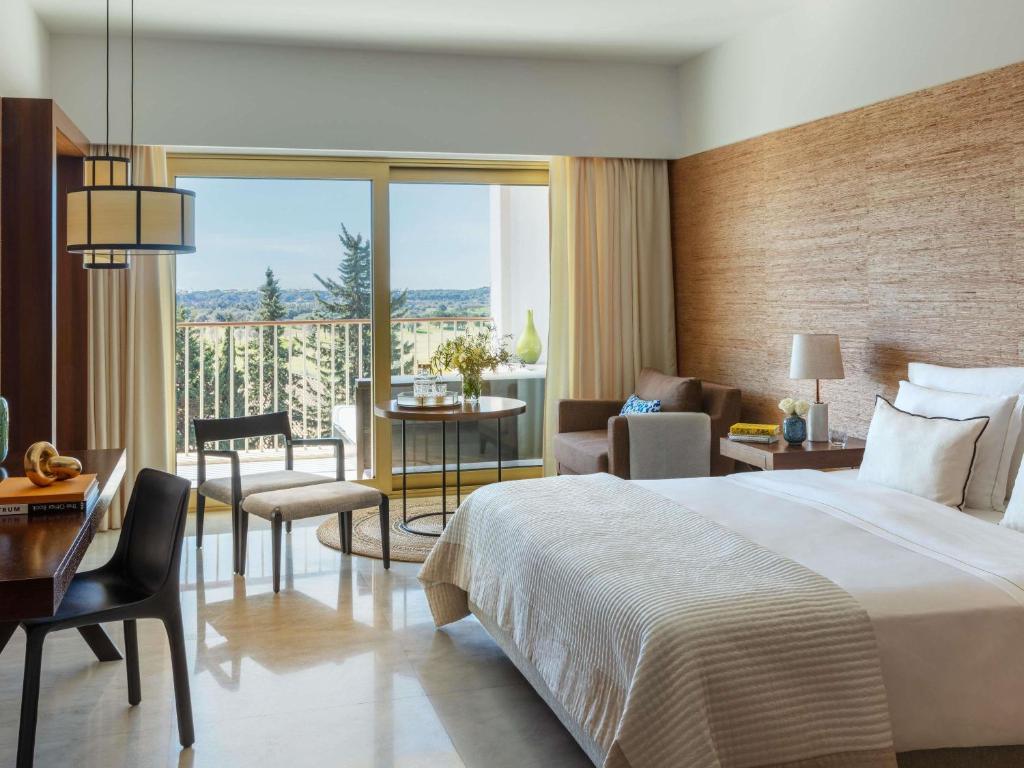 Кровать или кровати в номере Victoria Golf Resort and Spa Managed by Accor