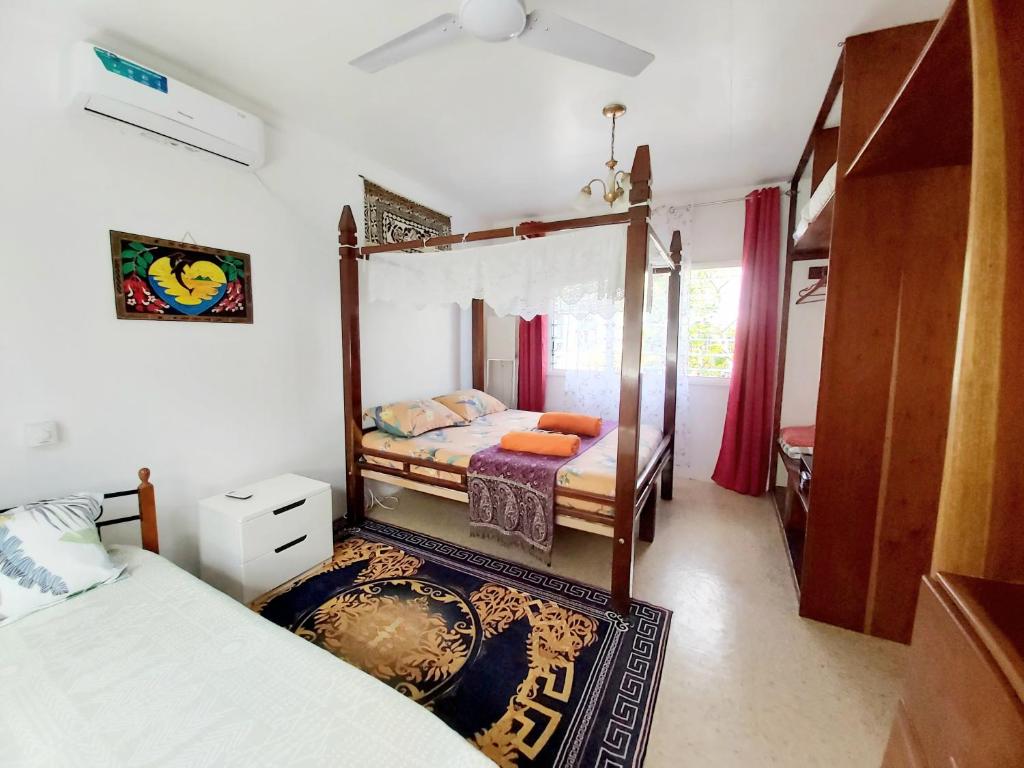 Postel nebo postele na pokoji v ubytování Ocean Breeze Guest House