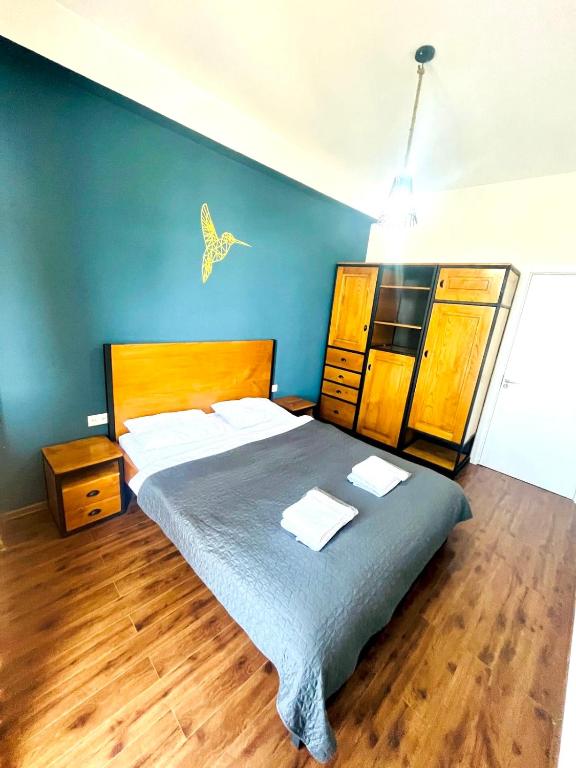Postel nebo postele na pokoji v ubytování Ortachala Romantic Apartments