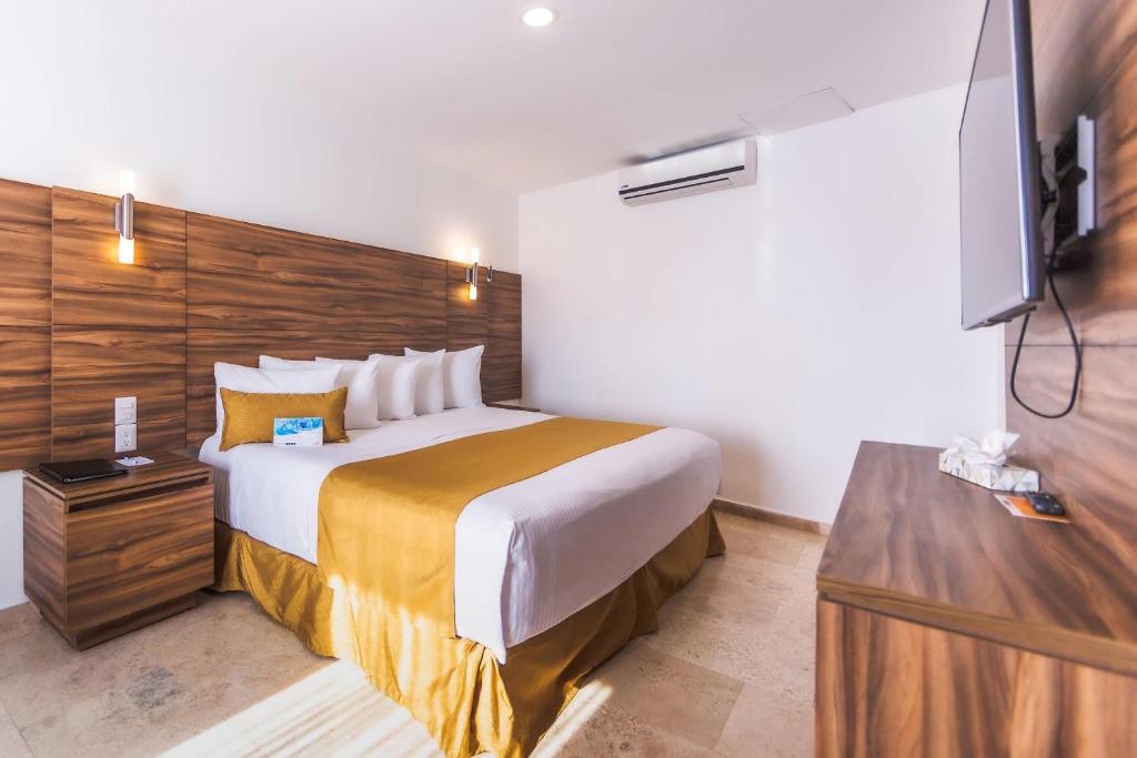Postel nebo postele na pokoji v ubytování Comfort Inn Queretaro Tecnologico