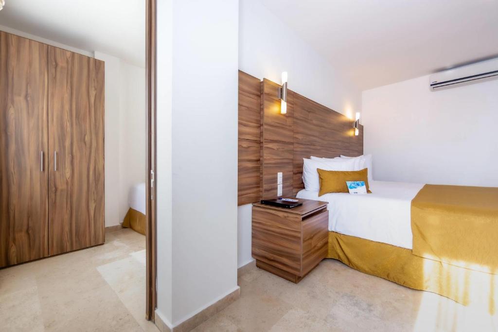 Postel nebo postele na pokoji v ubytování Comfort Inn Queretaro Tecnologico